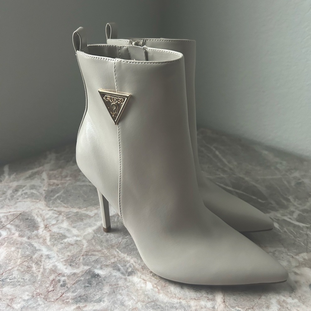 Guess women’s zip up boots